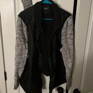 TORRID Black faux leather & marled grey terry bomber jacket.